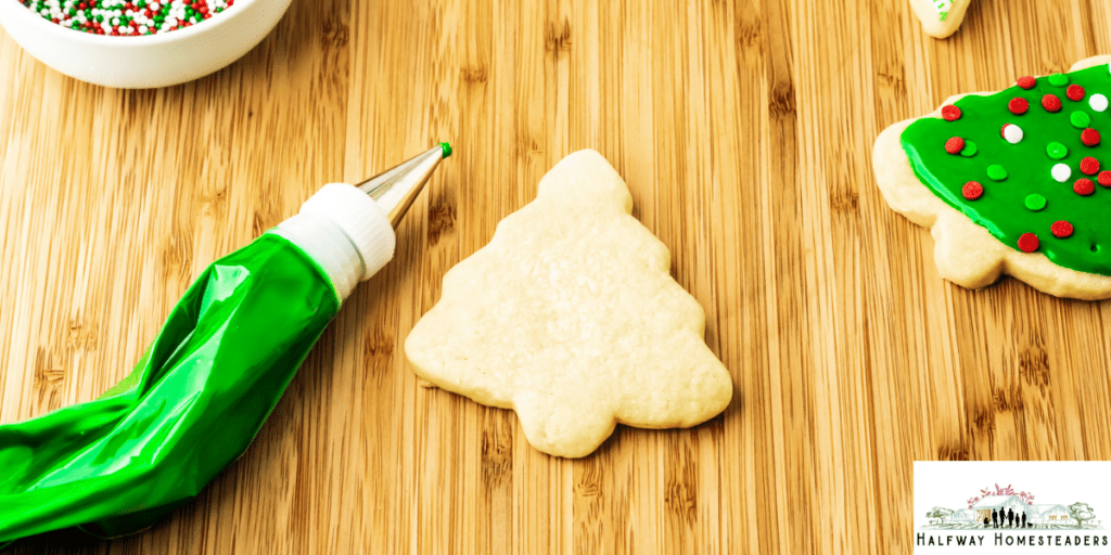 getting ready to frost the cookies 