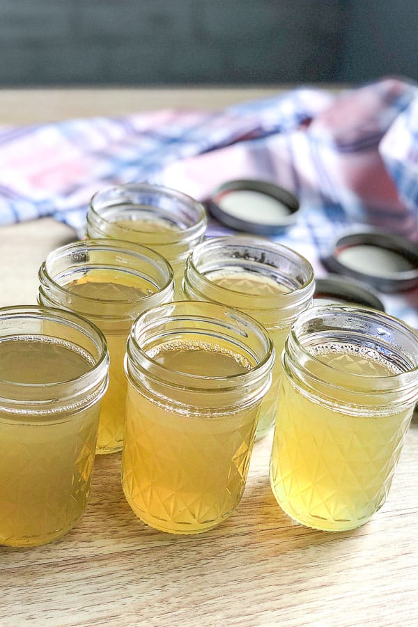 adding the liquid to the jars 